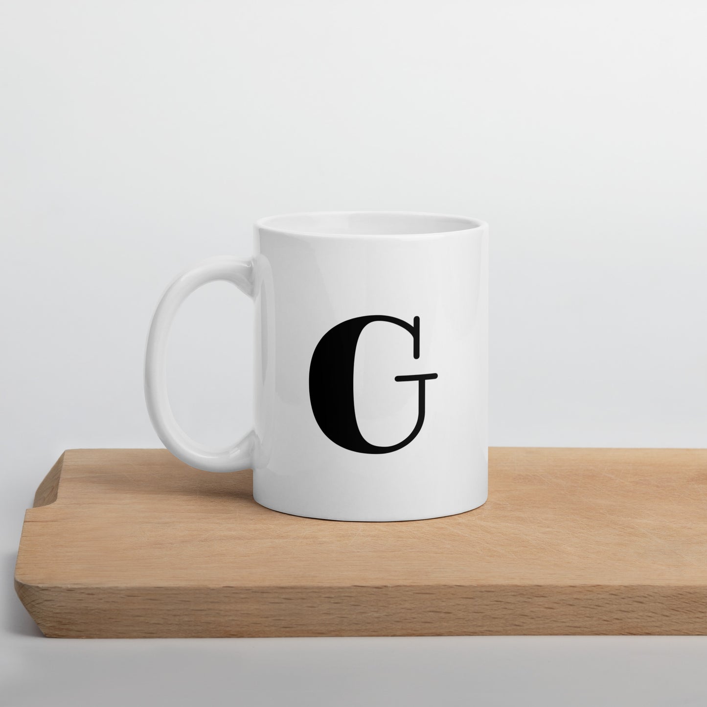 White glossy initial mug G