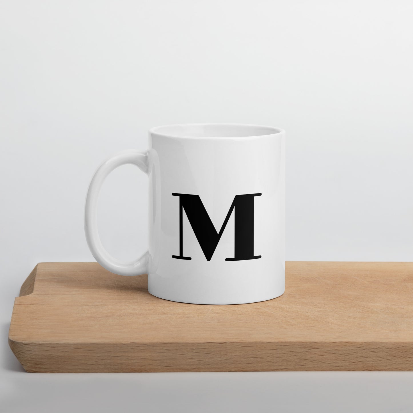 White glossy initial mug M