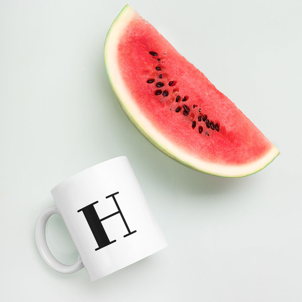 White glossy initial mug H