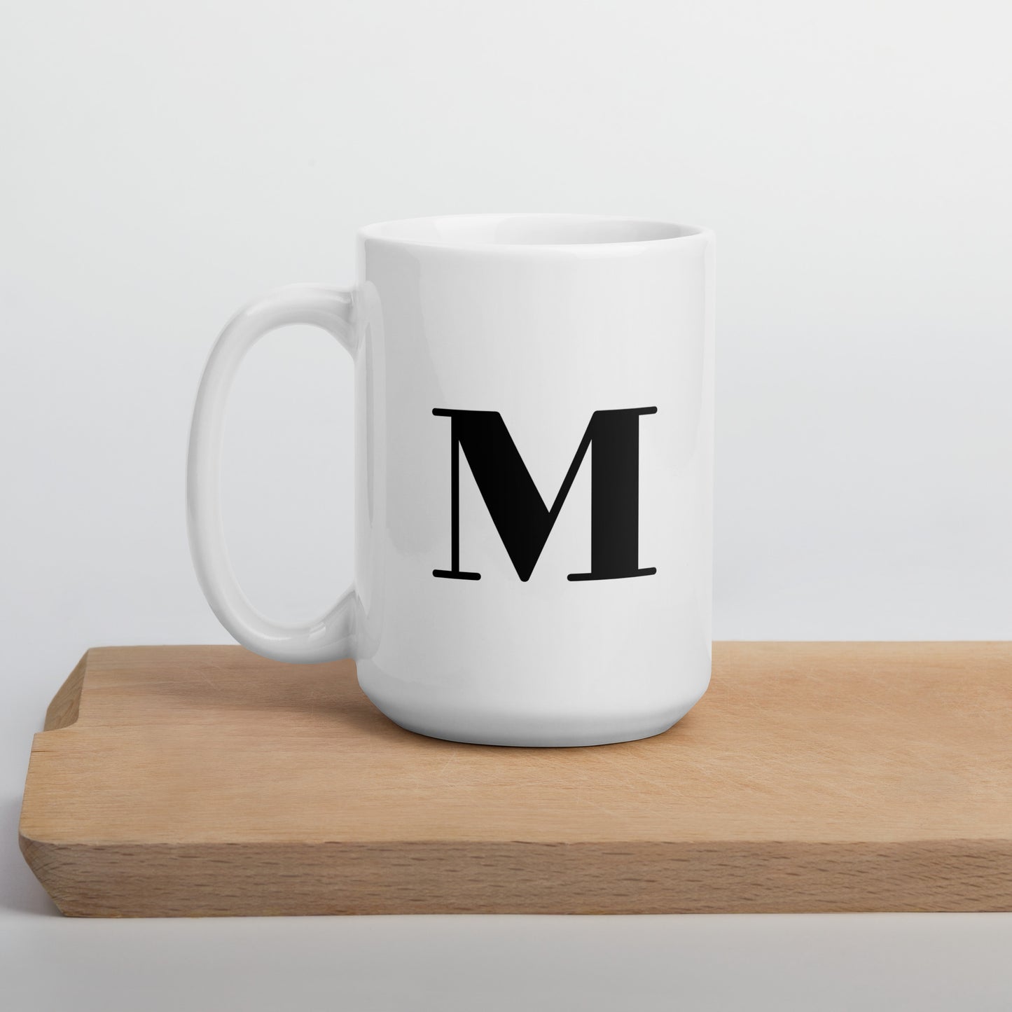 White glossy initial mug M