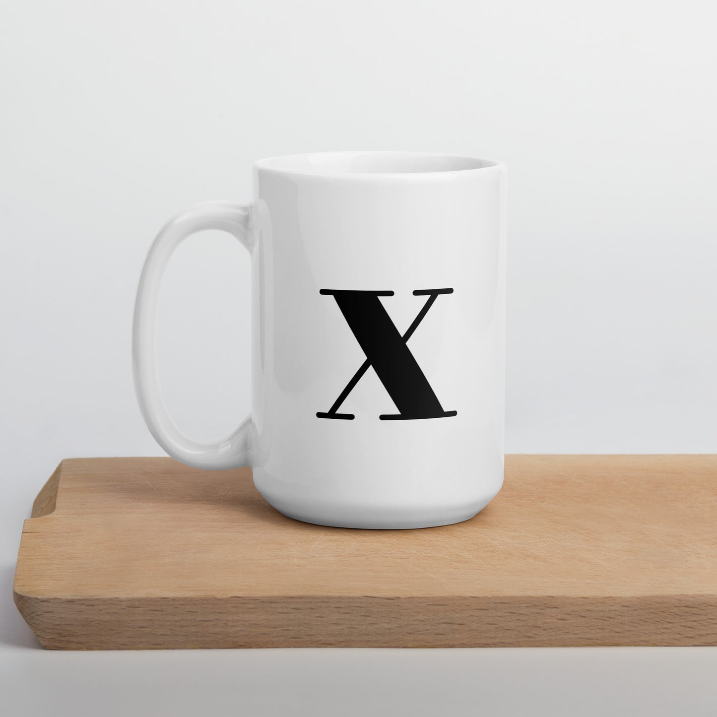 White glossy initial mug X